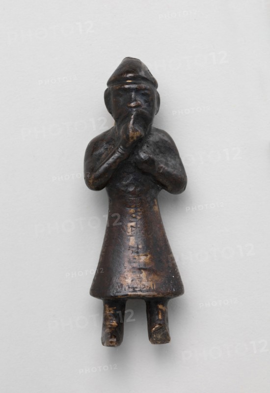 Figure, probably 11th-12th century.