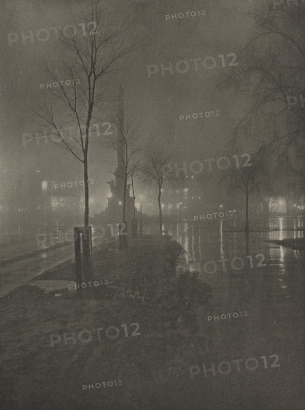 Wet Night, Columbus Circle, New York, 1899.