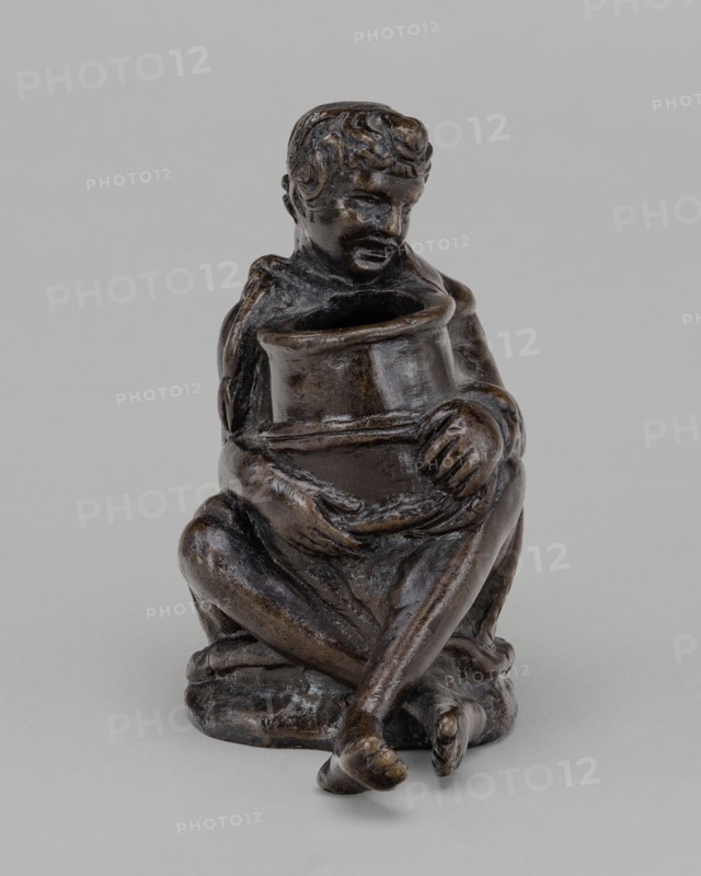 Seated Boy Holding a Jar (an Inkwell ?), first half 16th century.