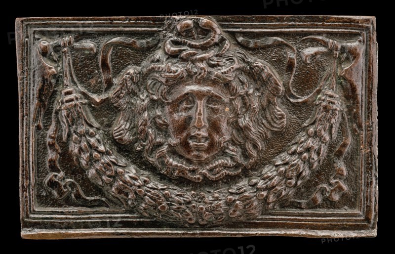 End panel of a writing casket: Medusa Head, Garland, and Bucrania, c. 1500.