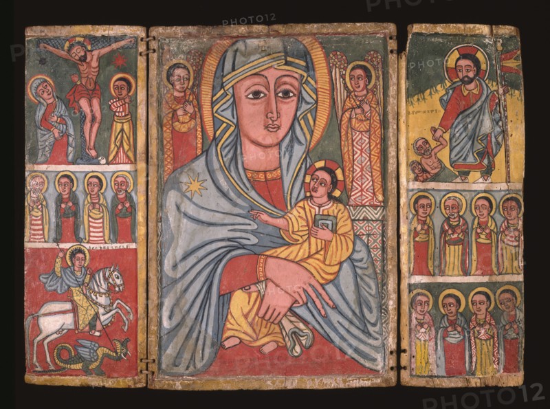 Icon , Late 17th-early 18th century. Triptych of distemper and gesso on wood. Left panel: Crucifixion; Saints; St. George and the dragon. Central panel: Madonna and child flanked by archangels. Right panel: Christ with Adam and Eve; Saints in two lower registers.