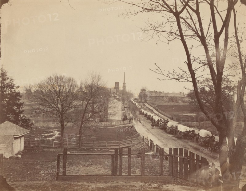Train of Army Wagons Entering Petersburg, Virginia, April 1865.