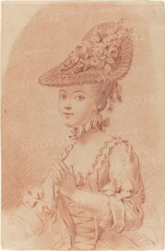 A Young Girl Wearing a Flowered Hat.