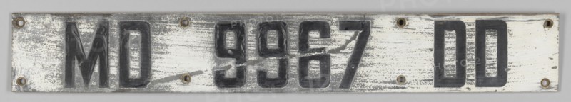 Marine license panel from oyster boat used in Chesapeake Bay, 1957. Creator: G. Haynard.
