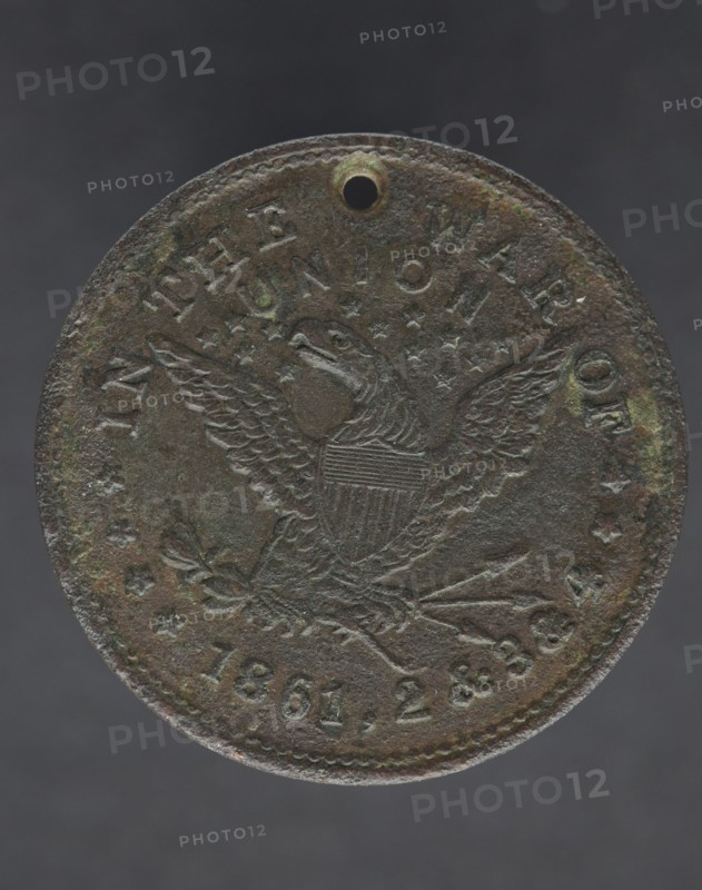 Identification tag for Cornelius Robinson, with American eagle, 1864. Creator: Unknown.