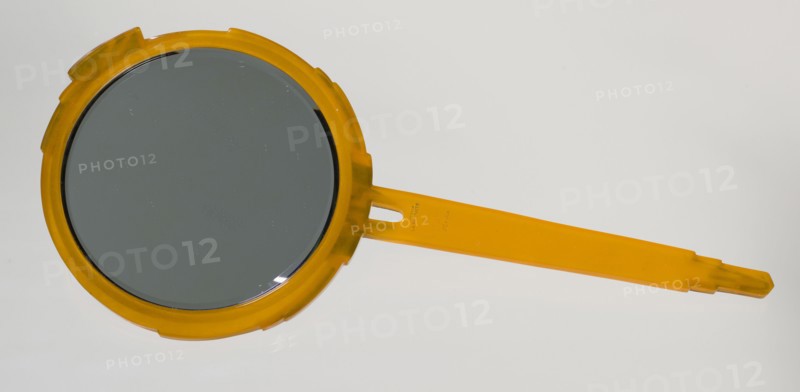 Bakelite hand mirror from dresser set owned by Lena Horne, mid 20th Century. Creator: Agalin.