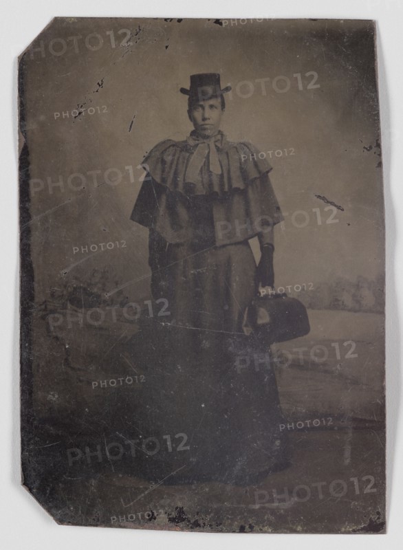 Tintype of a woman carrying a medical bag,1890s. Creator: Unknown.