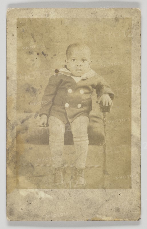 Photographic postcard of an unidentified young boy, 1926-1940s. Creator: Unknown.