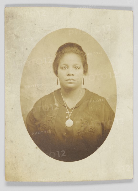 Photographic postcard of unidentified woman, 1917-1930. Creator: Unknown.