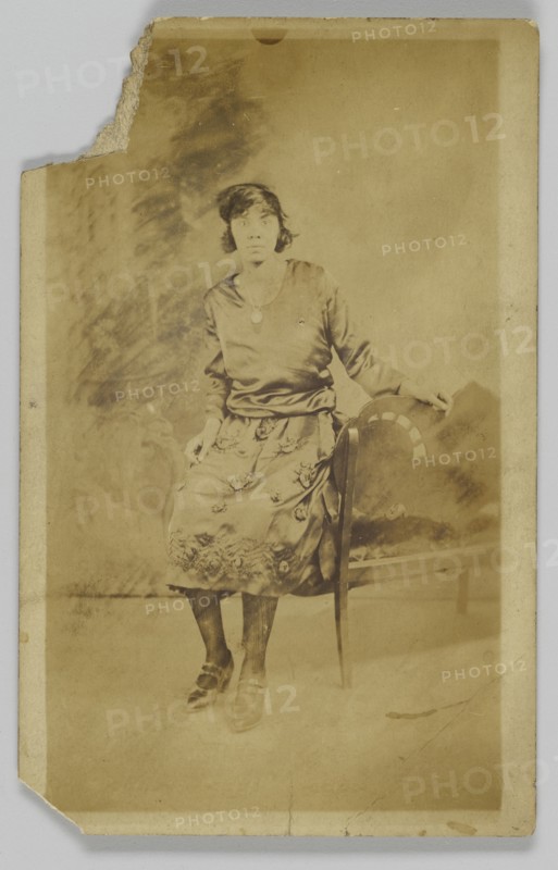 Photographic postcard of a woman, 1918-1930. Creator: Unknown.