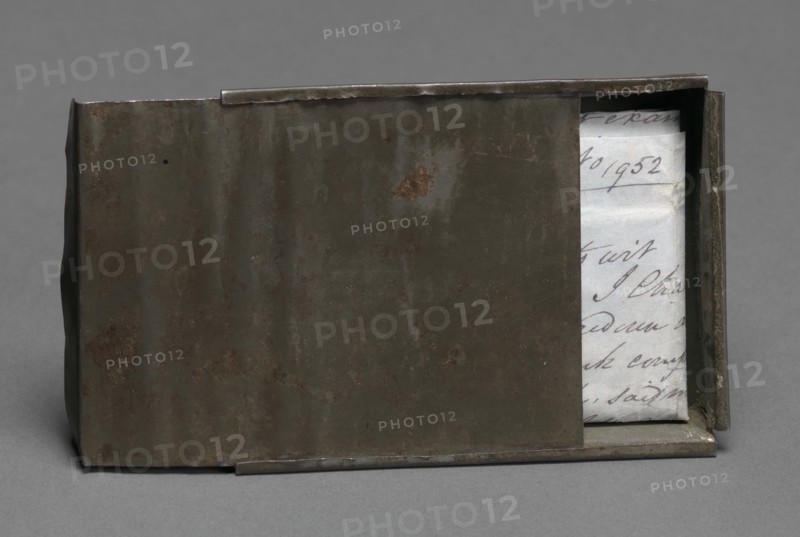 Freedom papers and handmade tin carrying box belonging to Joseph Trammell, 1852. Creator: Joseph Trammell.