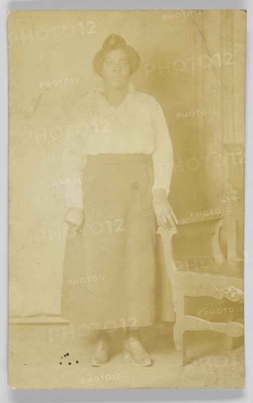 Photographic postcard of a woman, 1918-1930. Creator: Unknown.