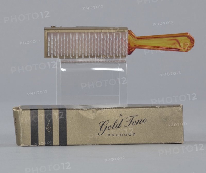 Plastic brush with box from Mae's Millinery Shop, 1941-1994. Creator: Gold Tone.