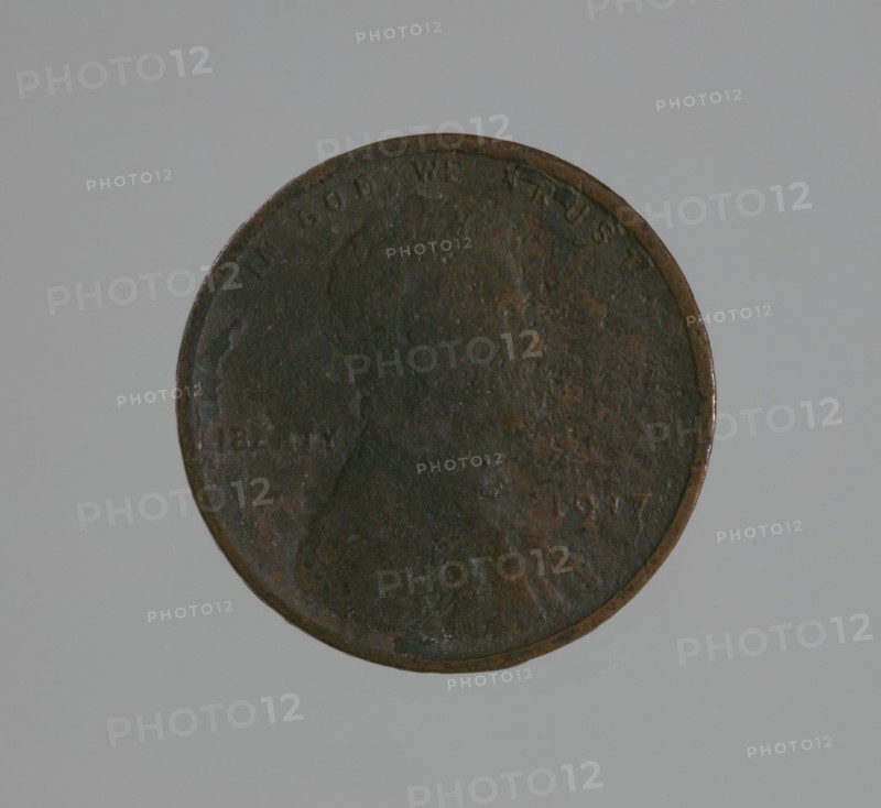 Riot penny charred during the 1921 Tulsa Race Massacre, 1917. Creator: United States Mint.