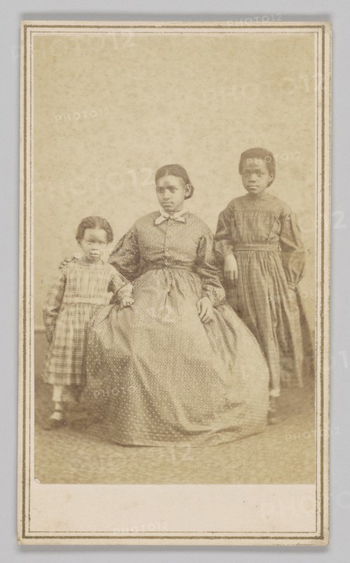 Carte-de-visite of a young woman and two children, 1864 - 1866. Creator: Alexander Gardner.