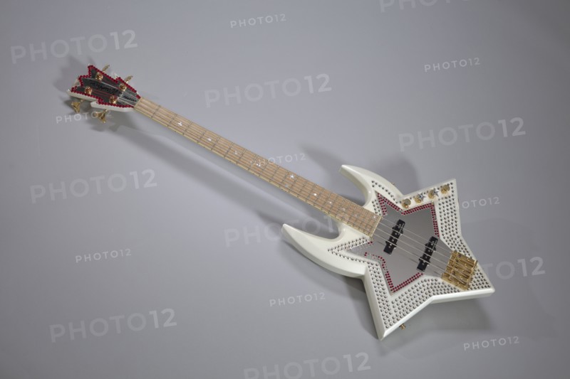 Bootsy Collins Space Bass guitar owned by Bootsy Collins, July 2002. Creator: Washburn Guitars.