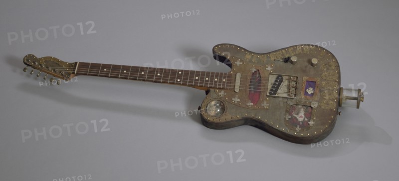 Voodoo Guitar "Marie" made by Don Moser with debris from Hurricane Katrina, 2005. Creator: Don Moser.