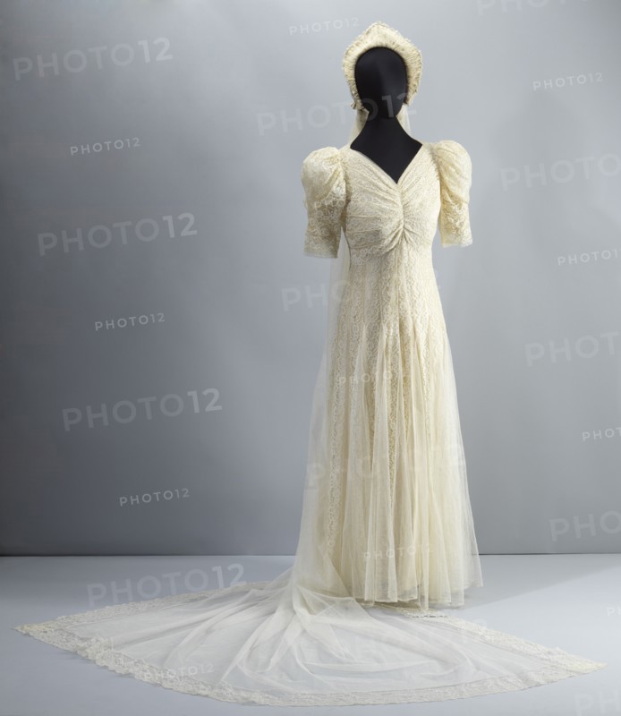 Wedding dress worn by Lollaretta Pemberton with veil and headpiece, 1939. Creator: Unknown.