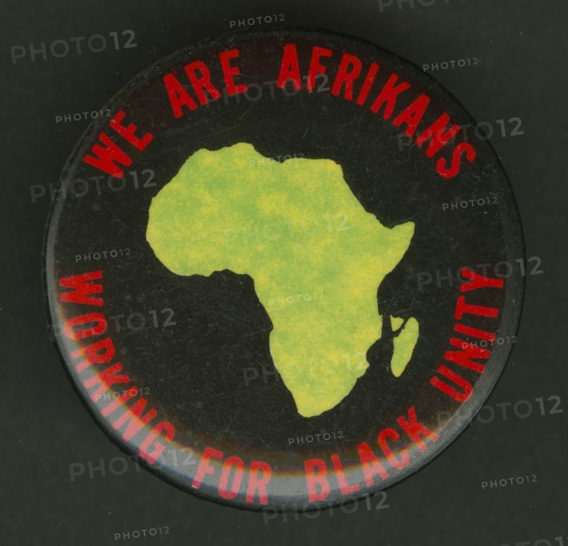 Pinback button promoting black unity, mid 20th century. Creator: Unknown.