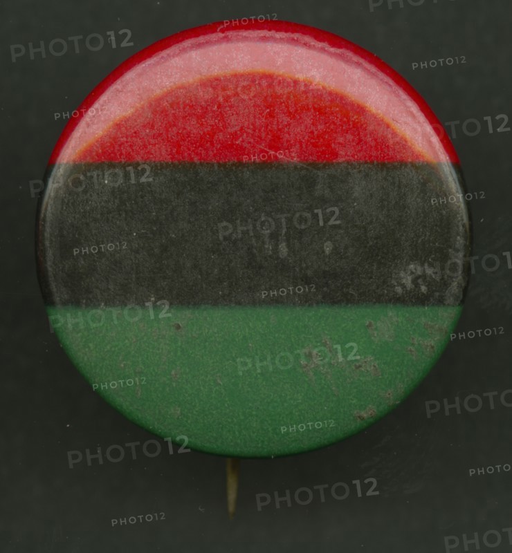 Pinback button of the Pan-African flag, after 1955. Creator: AFL-CIO.
