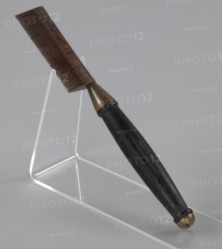 Hot comb from a travel hair care kit used by Anna Mae Queen Holmes, mid 20th century. Creator: Reck-Junior.