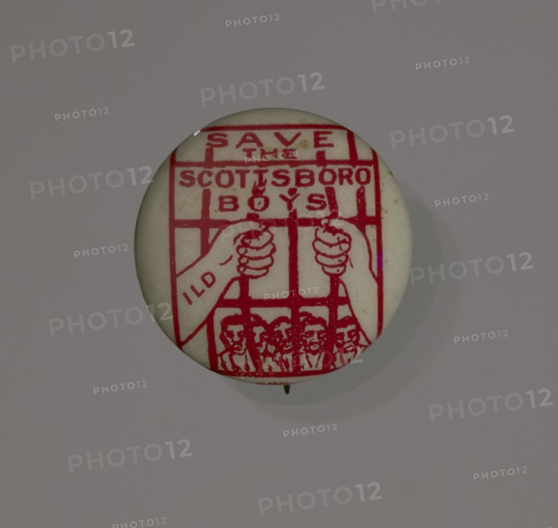 Pinback button supporting the Scottsboro Boys, 1931. Creator: Eagle Regalia Company.