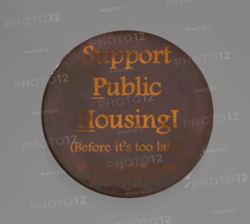 Pinback button promoting public housing in New York City, late 20th century. Creator: Unknown.