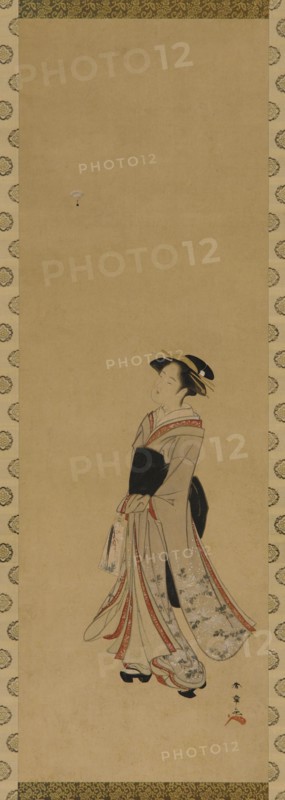 A girl playing battledore and shuttlecock, Edo period, 18th century. Creator: Shunsho.