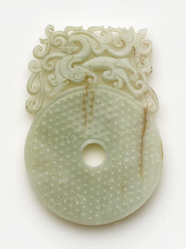 Disk (bi) with knobs, feline and dragon, Eastern Han dynasty, 100-220. Creator: Unknown.
