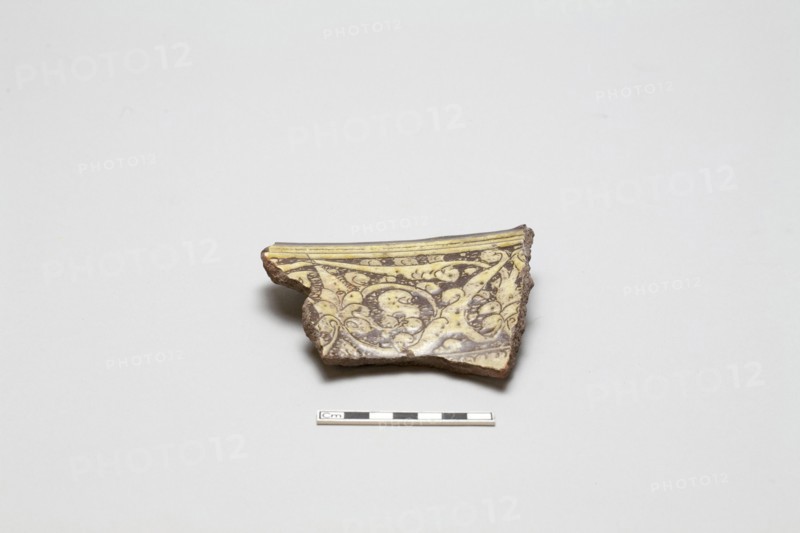 sherd, red body, white slip, pale yellow glaze, Mamluk period, 1250-1516. Creator: Unknown.