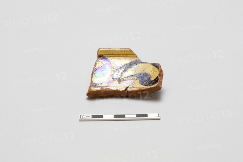 sherd, red body, white slip, yellow glaze with brown stain, Mamluk period, 1250-1516. Creator: Unknown.