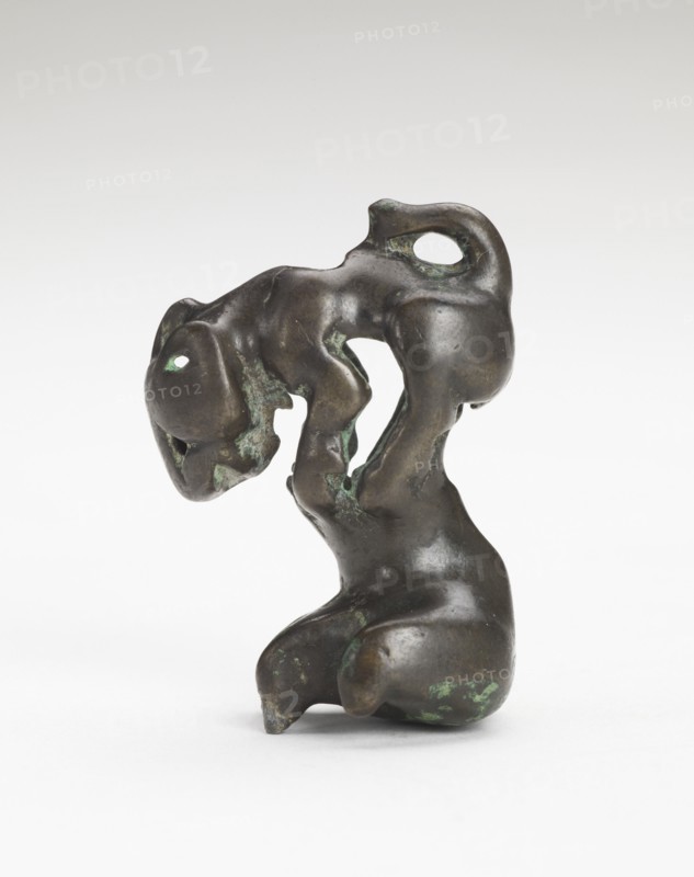 Ornament in the form of a feline-like animal on a foot-shaped stand, Han dynasty, 206 BCE-220 CE. Creator: Unknown.