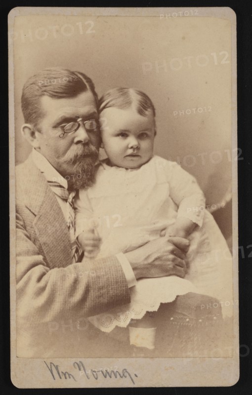 Portrait of William Young and Child, 1879. Creator: Samuel Montague Fassett.