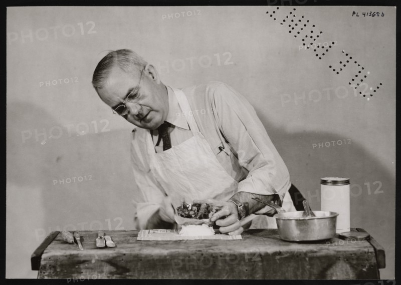 Frank Earl Holden Demonstrates Cutting into Mineral, January 18, 1951. Creator: United States National Museum Photographic Laboratory.