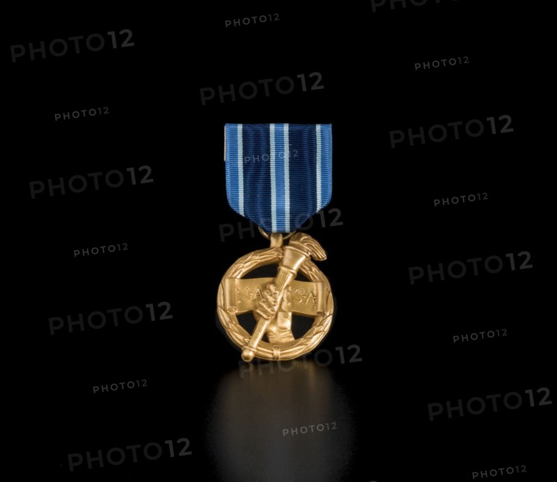 NASA Outstanding Leadership Medal awarded to Sally Ride, 1987. Creator: Unknown.