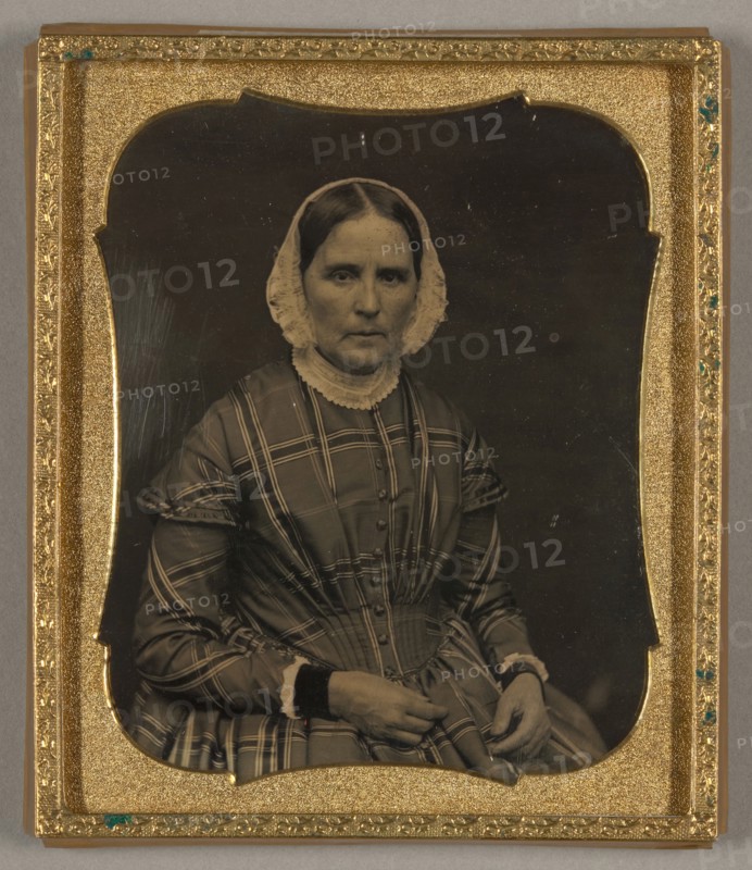 Untitled [portrait of a woman in a plaid dress], 1839/60.  Creator: Unknown.