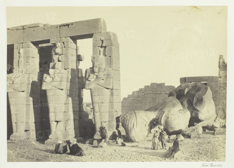Osiride Pillars and Great Fallen Colossus, at the Memnonium, Thebes, 1857. Creator: Francis Frith.