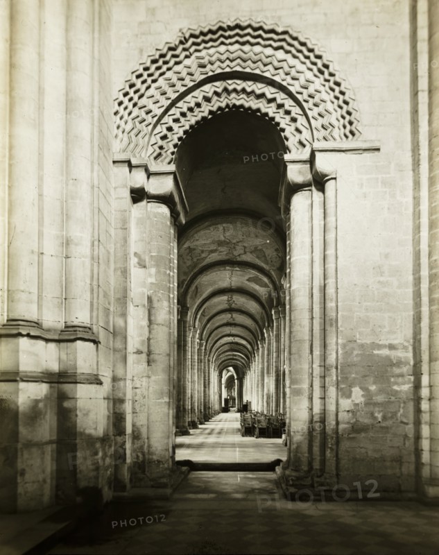 Ely Cathedral: South Aisle to East, from Southwest Transept, 1891. Creator: Frederick Henry Evans.