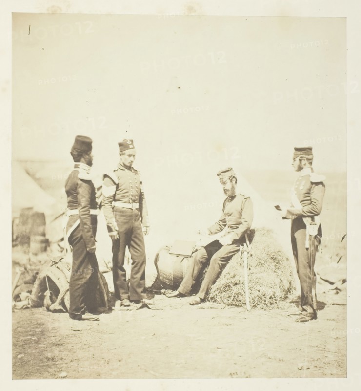 Captain Walker, 30th Regiment, reading General Orders, 1855. Creator: Roger Fenton.