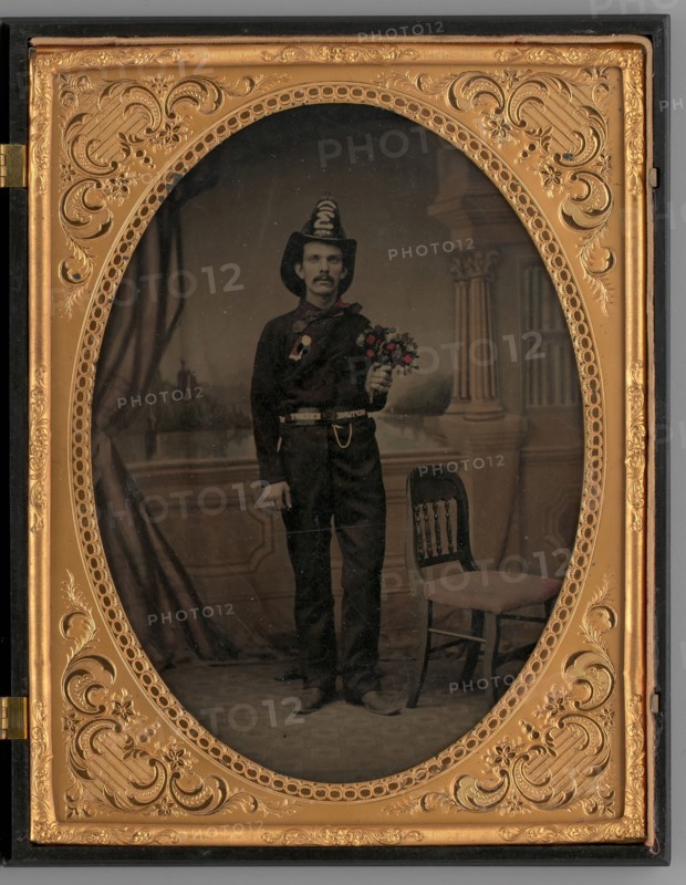 Untitled (Portrait of a Standing Man Wearing a Fireman's Uniform), 1865. Creator: Unknown.