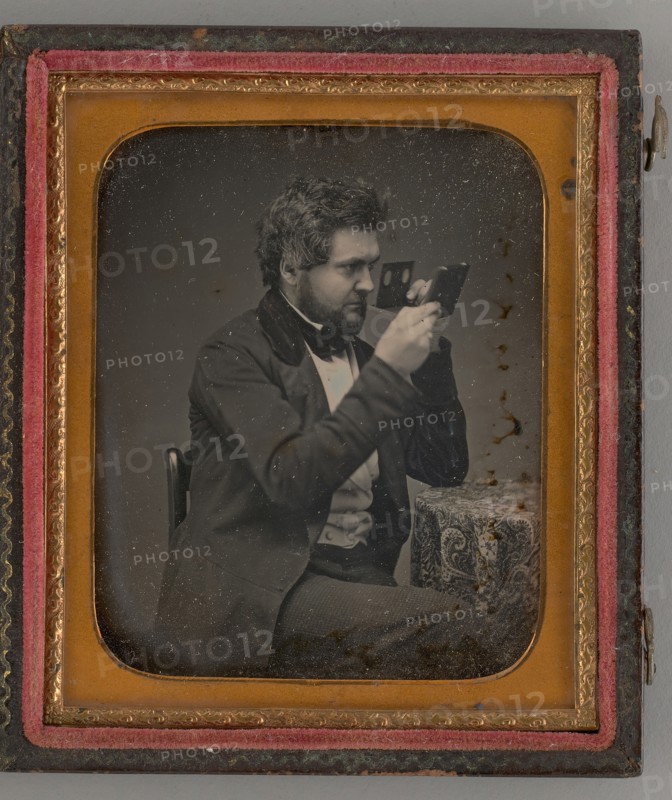 Untitled (Portrait of Man Looking Through a Stereoscope), 1856. Creator: Unknown.