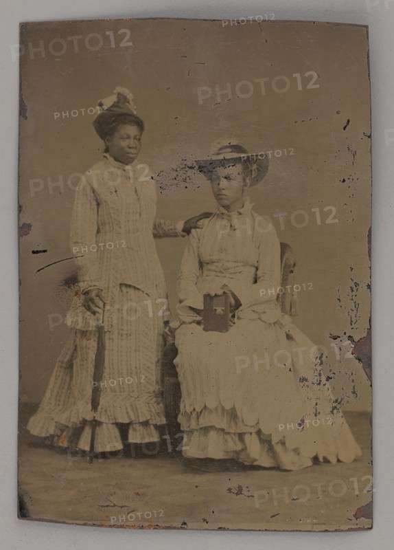 Untitled (Portrait of One Standing Woman and One Seated Woman), 1860s. Creator: Unknown.