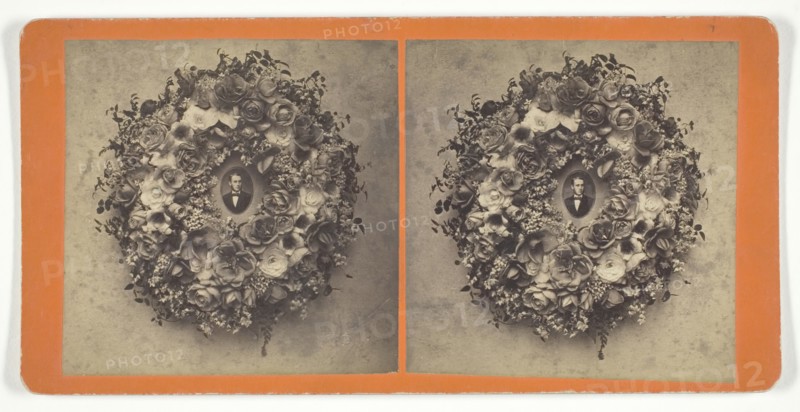 Untitled [wreath of roses with portrait photograph], 1879. Creator: Frank Lawrence.