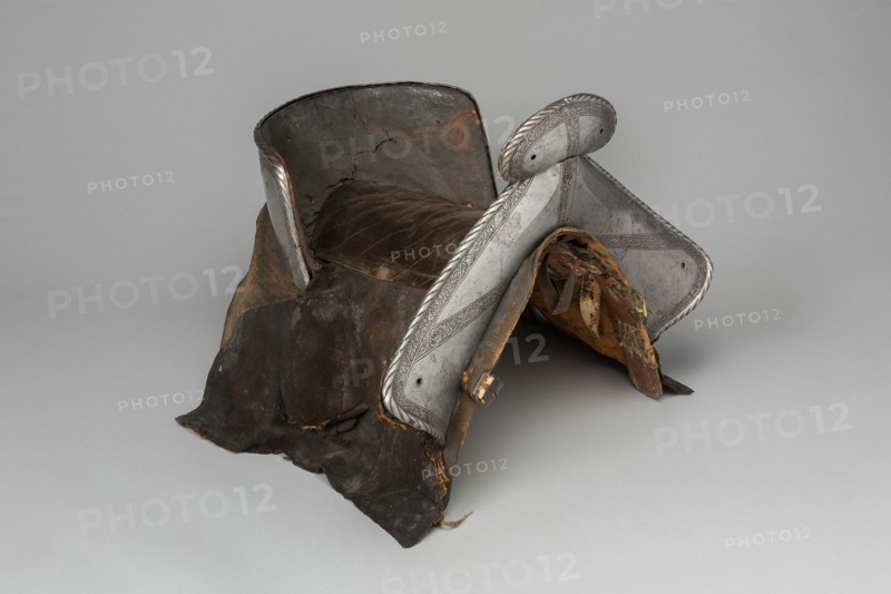 Saddle with Four Saddle Plates, Southern Germany, c. 1540. Creator: Unknown.