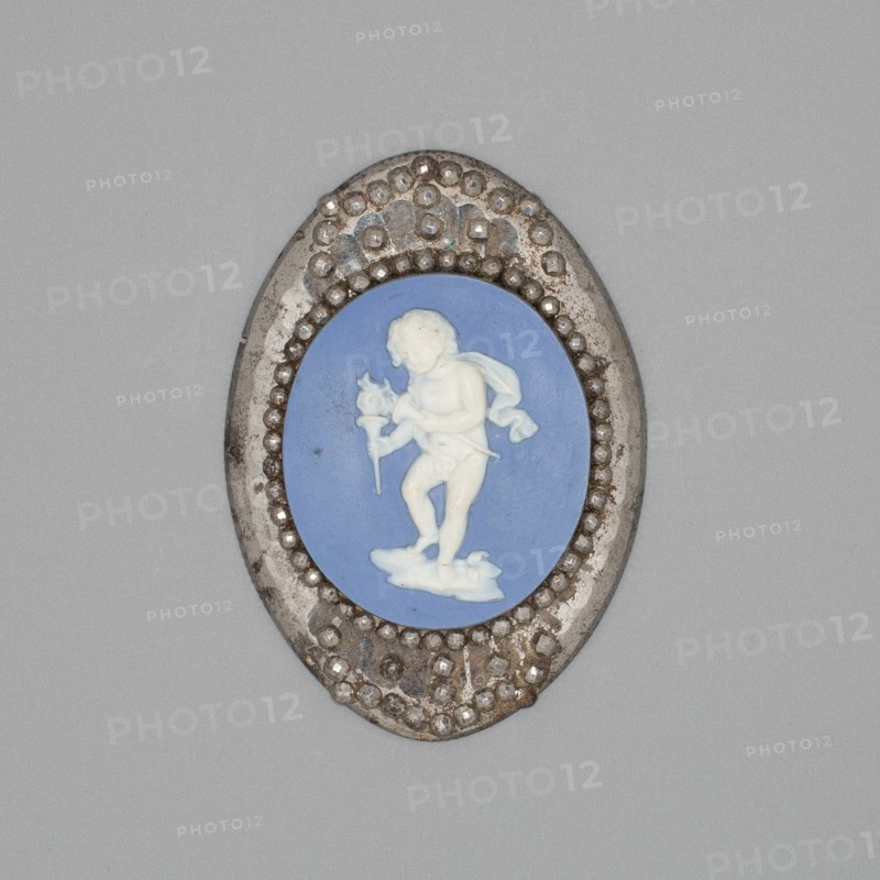 Medallion with Cupid Lighting His Wick, Burslem, Late 18th century. Creator: Wedgwood.