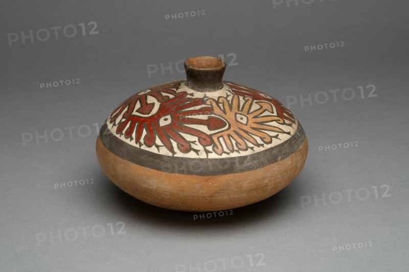Low Jar with Small Spout Depicting a Repeated Abstract Star or Face Motif, 180 B.C./A.D. 500. Creator: Unknown.