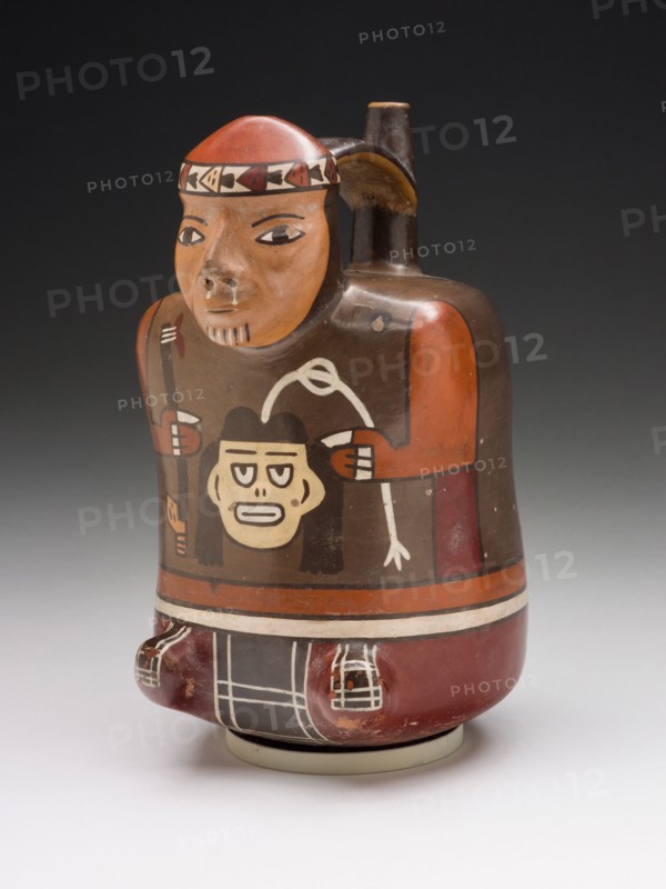 Vessel in the Form of a Warrior Holding a Trophy Head and Dart Throwers, 180 B.C./A.D. 500. Creator: Unknown.