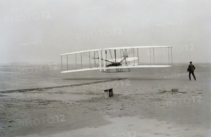 First flight of Wright brothers aircraft, Kitty Hawk, North Carolina, USA, December 17, 1903.  Creator: Unknown.