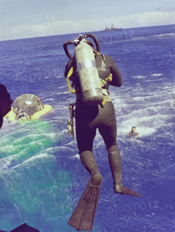 Navy diver leaps from helicopter, 1965. Creator: NASA.