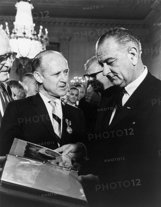 Mariner photos presented to President Johnson, 1965. Creator: NASA.
